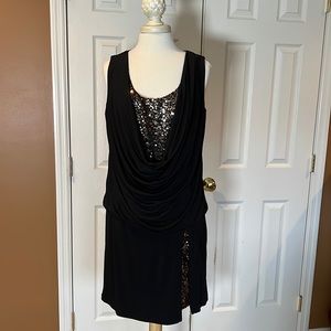 Ronni Nicole size 10 cute pullover dress with sequins at top and slit in skirt